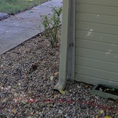 downspout pulling away from house